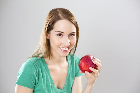 A girl with an apple