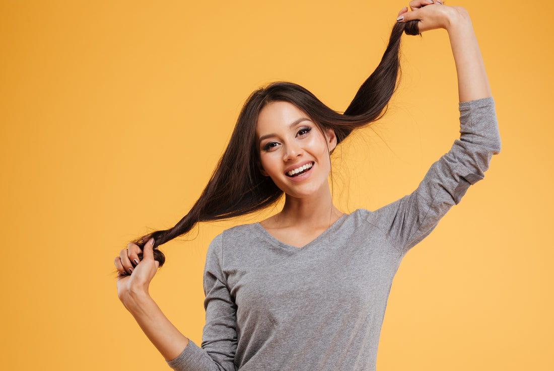 A woman holding her hair